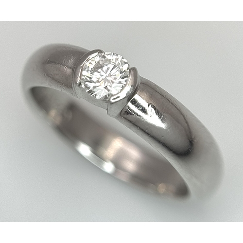 352 - A Tiffany 950 Platinum Diamond Solitaire Ring. 0.25ct. Size I. 
6.1g. Original Tiffany packaging. Re... 