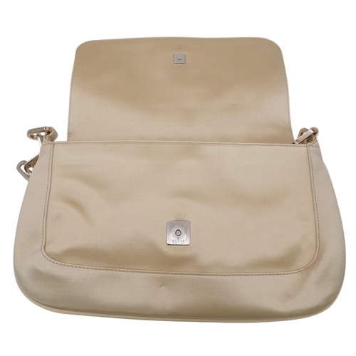 412 - A Gucci Satin Chain Shoulder Bag. Beige satin exterior with a silver-tone chain-link strap. Flap ope... 