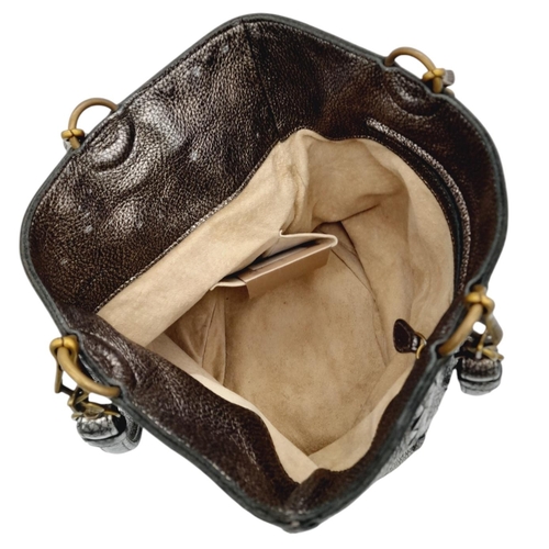 426 - A Bottega Veneta Intrecciato Trimmed Bucket Bag. Metallic leather exterior with signature intrecciat... 