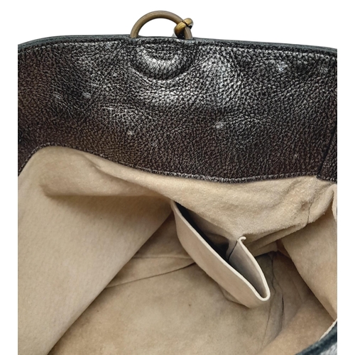 426 - A Bottega Veneta Intrecciato Trimmed Bucket Bag. Metallic leather exterior with signature intrecciat... 