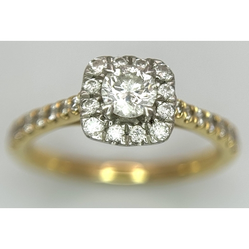 449 - An 18K Yellow Gold, Platinum and 0.5ctw Diamond Ring. Brilliant round cut central diamond with diamo... 