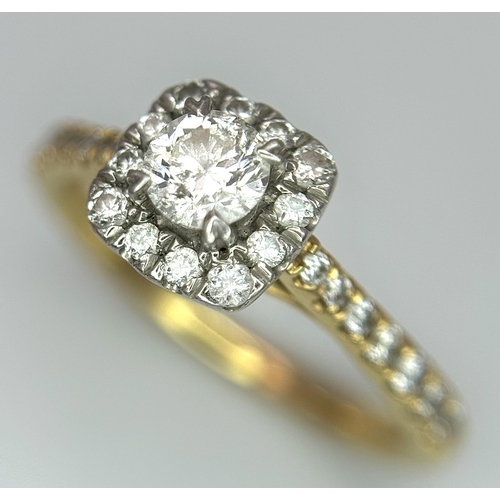 449 - An 18K Yellow Gold, Platinum and 0.5ctw Diamond Ring. Brilliant round cut central diamond with diamo... 