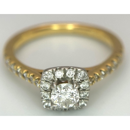 449 - An 18K Yellow Gold, Platinum and 0.5ctw Diamond Ring. Brilliant round cut central diamond with diamo... 