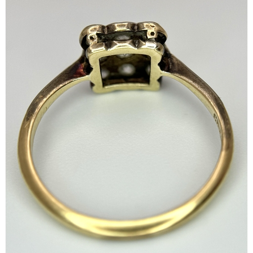 504 - An 18K Yellow Gold, Platinum and Diamond Art Deco Ring. Nine old cut diamonds in a square formation.... 