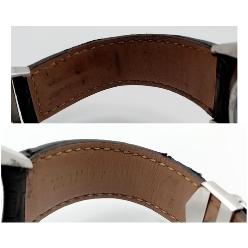 76 - A Tag Heuer Carrera Automatic Chronograph Gents Watch. 1887 calibre. Brown leather strap. Stainless ... 