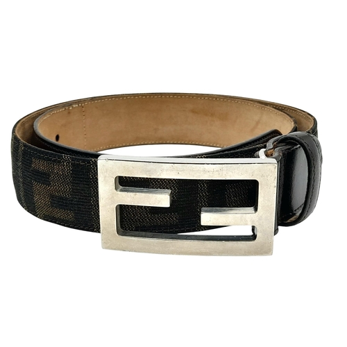 1050 - A Fendi Zucca FF Buckle Belt. Classic Zucca monogram canvas with black leather trim and a beige leat... 