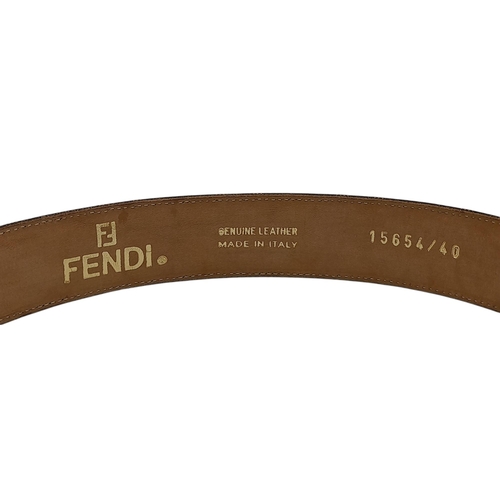 1050 - A Fendi Zucca FF Buckle Belt. Classic Zucca monogram canvas with black leather trim and a beige leat... 