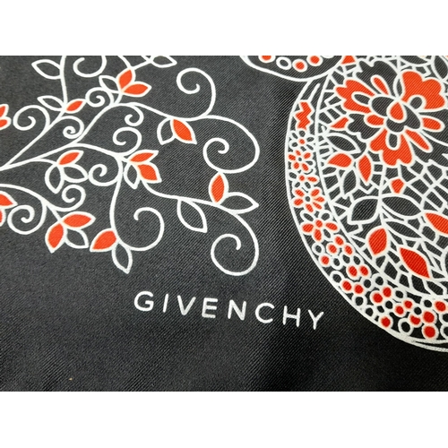 1078 - A Givenchy Silk Scarf. 68cm x 68cm. In good condition but please see photos or request a condition r... 