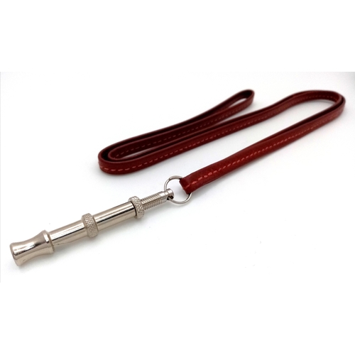 159 - An Hermes Whistle with Attached Leather Strap. Original packaging. Ref: 9634