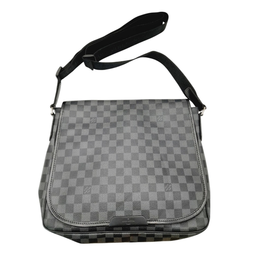 194 - A Louis Vuitton Damier Graphite Damien MM Messenger Bag. Coated canvas exterior with leather trim, s... 