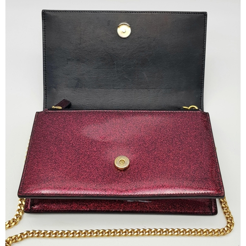 264 - An Yves Saint Laurent Red Glitter Kate Wallet Bag. Patent leather exterior with gold-toned hardware,... 