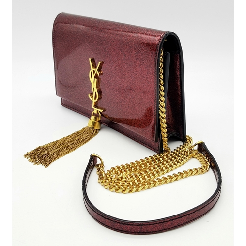 264 - An Yves Saint Laurent Red Glitter Kate Wallet Bag. Patent leather exterior with gold-toned hardware,... 