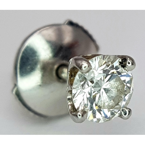 271 - A De Beers Platinum and Diamond Single Stud Earring. 0.20ct. 0.45g. Ref: 20832