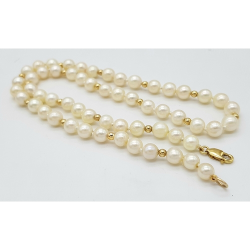 281 - A Cultured Pearl Necklace with 9K Gold Clasp. 44cm