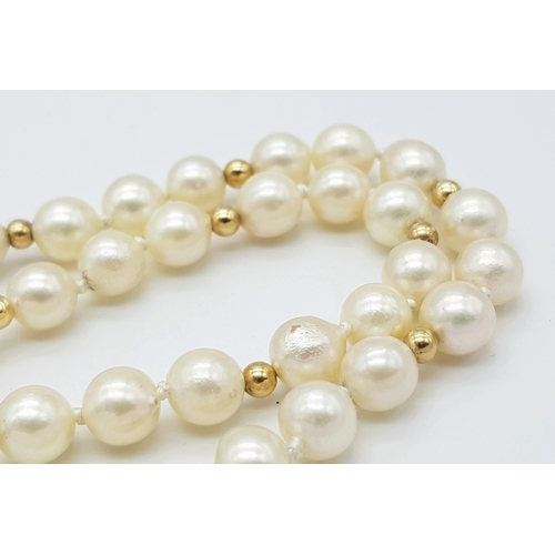 281 - A Cultured Pearl Necklace with 9K Gold Clasp. 44cm