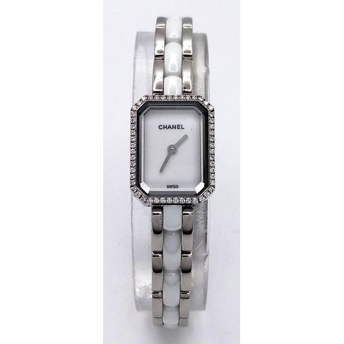 309 - A Chanel Premiere Diamond Quartz Ladies Watch. Stainless steel and white ceramic bracelet. Stainless... 