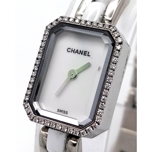 309 - A Chanel Premiere Diamond Quartz Ladies Watch. Stainless steel and white ceramic bracelet. Stainless... 