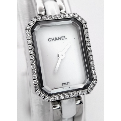 309 - A Chanel Premiere Diamond Quartz Ladies Watch. Stainless steel and white ceramic bracelet. Stainless... 