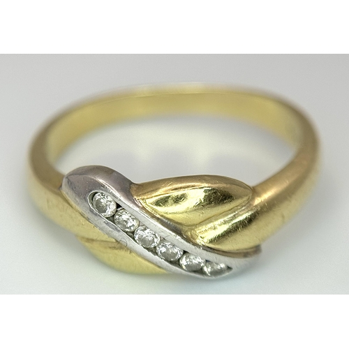 316 - A 14K Yellow Gold Diamond Channel Set Ring. Diagonal form. 
Size N. 3.7g. 0.20ctw.