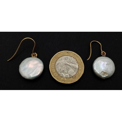 351 - A Pair of 9K Gold, Mother of Pearl Coin Earrings.