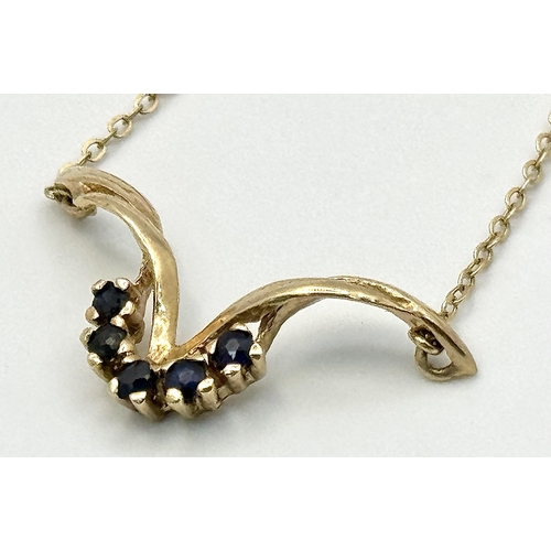 393 - A Vintage 9K Yellow Gold and Sapphire Lavaliere Necklace. 40cm. 2.1g