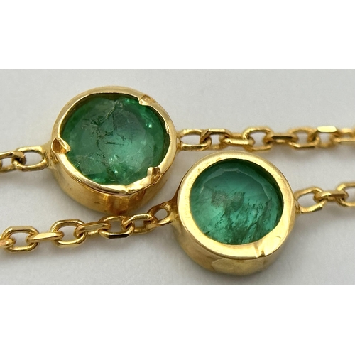 491 - An 18K Yellow Gold Emerald Necklace. 10 round-cut set emeralds. 46cm. 3.8g