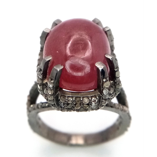 499 - A 20ct Ruby Cabochon Ring with 2ctw of Diamond Accents. Set in 925 Silver. Size N. CD-1675