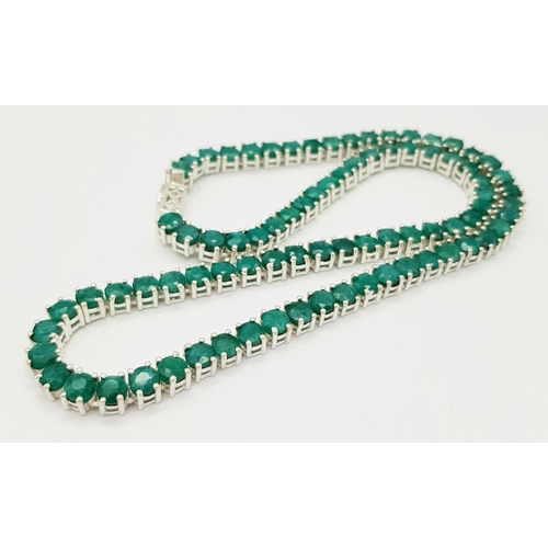 520 - An Emerald Gemstone Tennis Necklace. Set in 925 Silver. 44cm. CD-1669