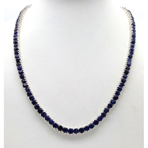 527 - A Blue Sapphire Gemstone Tennis Necklace. Set in 925 Silver.
44cm. CD-1670.