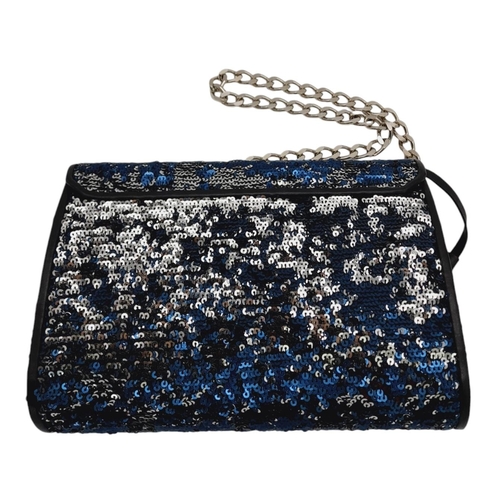 539 - An Aspinal of London Blue and Silver Sequinned Shoulder Bag. Sequinned exterior with black leather t... 