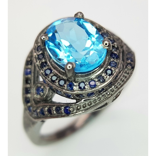 624 - A 2.5ct Blue Topaz Gemstone Ring with Diamond Accents. Set in 925 silver. Size O 1/2. CD-1684