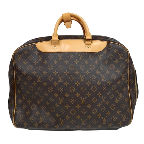 69 - A Louis Vuitton Monogram Alize 24H Boston Bag. LV monogram coated canvas exterior, with natural vach... 