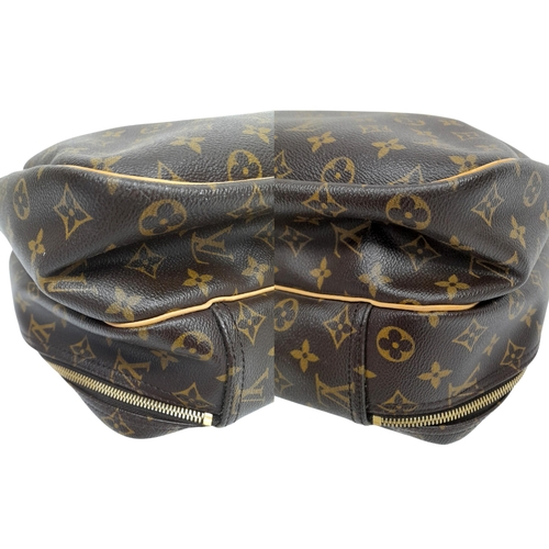 69 - A Louis Vuitton Monogram Alize 24H Boston Bag. LV monogram coated canvas exterior, with natural vach... 