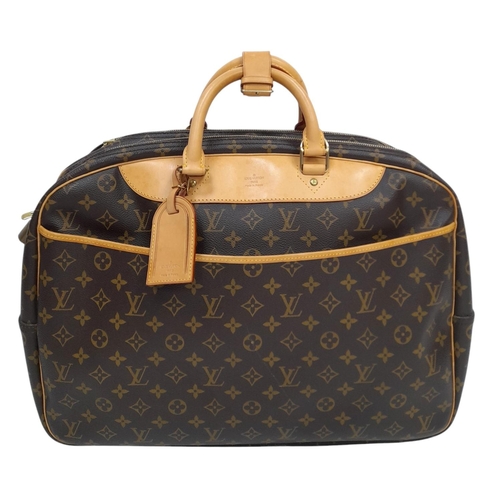 69 - A Louis Vuitton Monogram Alize 24H Boston Bag. LV monogram coated canvas exterior, with natural vach... 