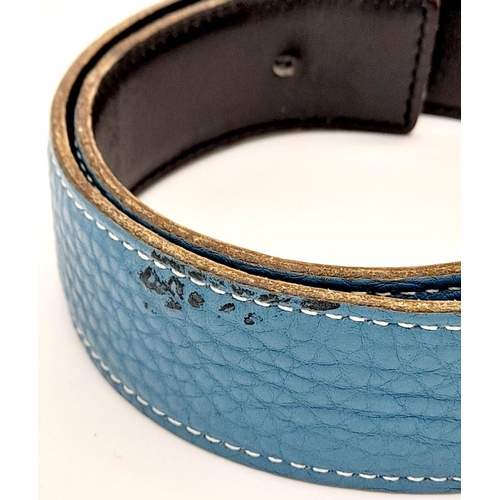 1089 - A Hermes Blue Constance Reversible Belt. Blue grained leather on one side and black smooth leather o... 