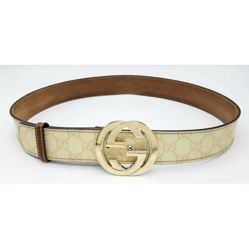 1377 - A Gucci Beige GG Canvas Belt with Gold-Toned GG Buckle. Light gold hardware, 102cm total length. Som... 