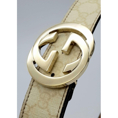 1377 - A Gucci Beige GG Canvas Belt with Gold-Toned GG Buckle. Light gold hardware, 102cm total length. Som... 