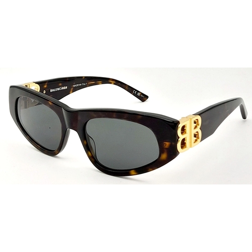 1325 - A Pair of Balenciaga Sunglasses, frames with gold-toned 