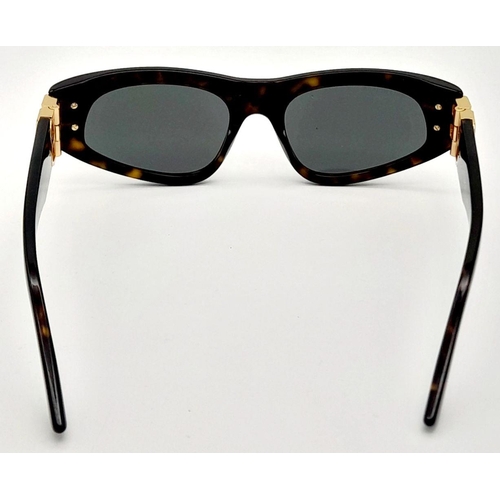 1325 - A Pair of Balenciaga Sunglasses, frames with gold-toned 