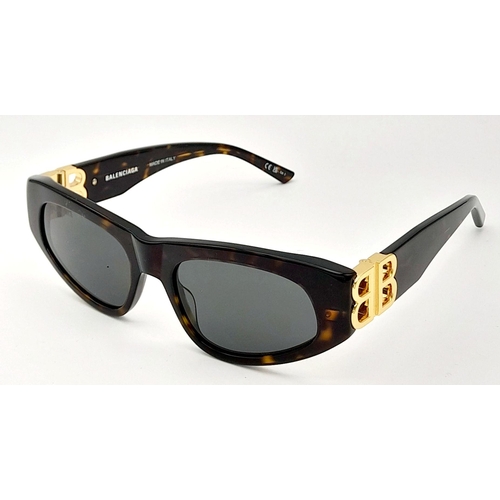 1325 - A Pair of Balenciaga Sunglasses, frames with gold-toned 