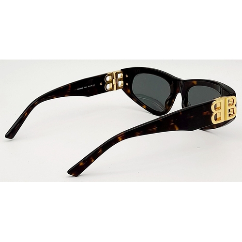 1325 - A Pair of Balenciaga Sunglasses, frames with gold-toned 