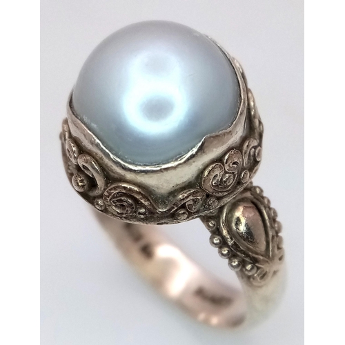 1553 - A Vintage Suarti Sterling Silver Pearl Set Ornate Detailed Ring Size R. The Ring is Set with a 1.1cm... 