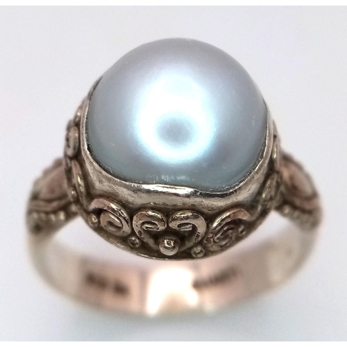 1553 - A Vintage Suarti Sterling Silver Pearl Set Ornate Detailed Ring Size R. The Ring is Set with a 1.1cm... 