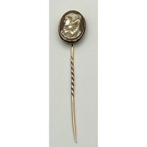 1310 - An Antique 9K Yellow Gold Cameo Stick Pin. 8cm. 4g total weight.