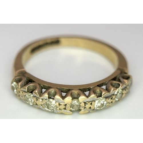 1374 - A 9K Yellow Gold Seven Stone Diamond Ring. Size K. 2.5g total weight.