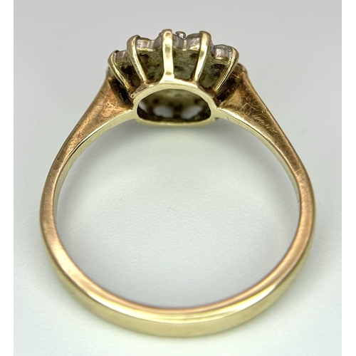 1395 - A 9K Yellow Gold White Stone Cluster Ring. One stone missing. Size K. 2.2g