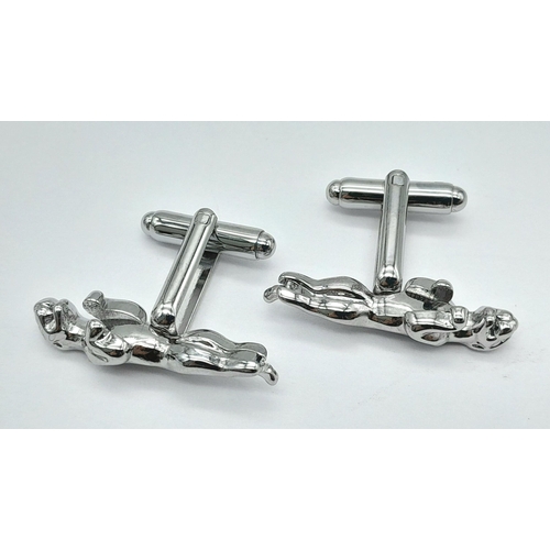 1466 - A quality pair of JAGUAR cufflinks in a jeweller’s presentation box. Jaguar length: 30 mm.