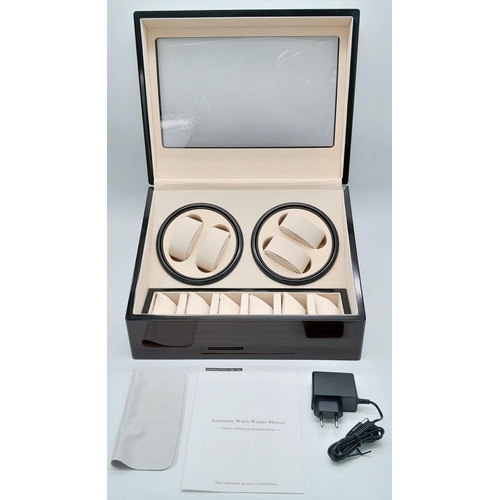 1297 - A top-quality Automatic Watch Winder and Storage Box with window. Beautiful “piano” finish, quiet mo... 