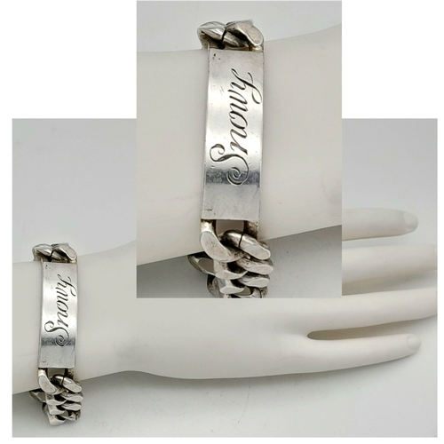 311 - A Chunky Sterling Silver Curb Identity Bracelet. If your name is Snowy - it's your lucky day! 22cm. ... 