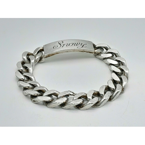 311 - A Chunky Sterling Silver Curb Identity Bracelet. If your name is Snowy - it's your lucky day! 22cm. ... 